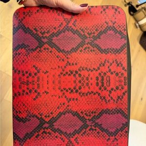 Brand New Burga red snake leather computer bag. Fits a 13 inch computer.